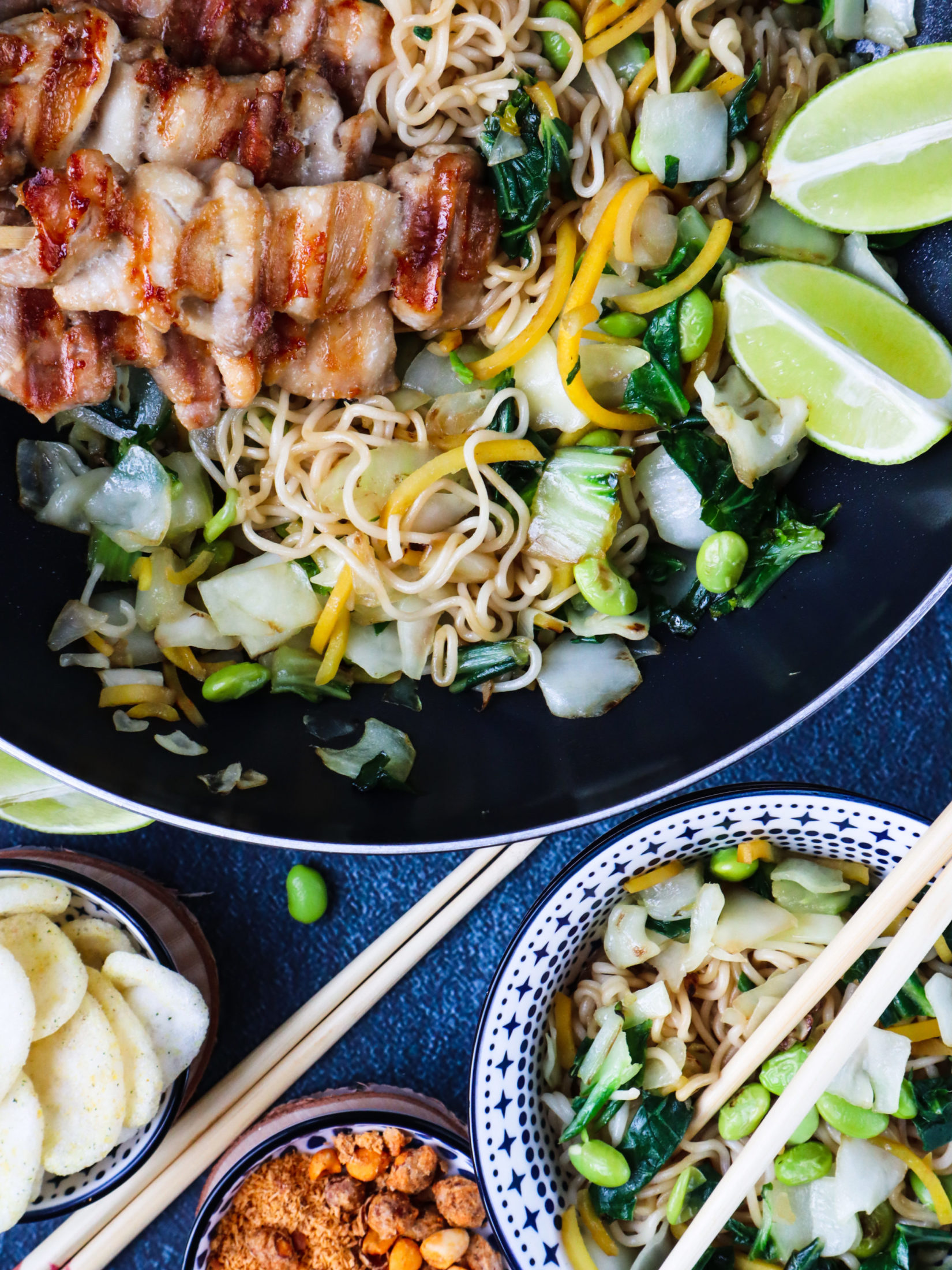 Wok noodles with chicken thigh skewers